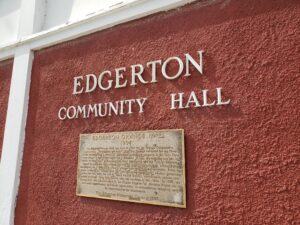 The Edgerton Community Hall sign on the outside of the building