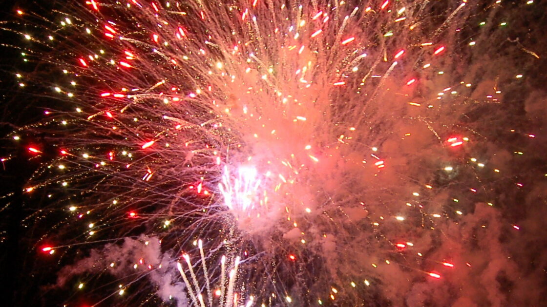 A firework explodes at the Community Picnic and Fireworks Show in Edgerton